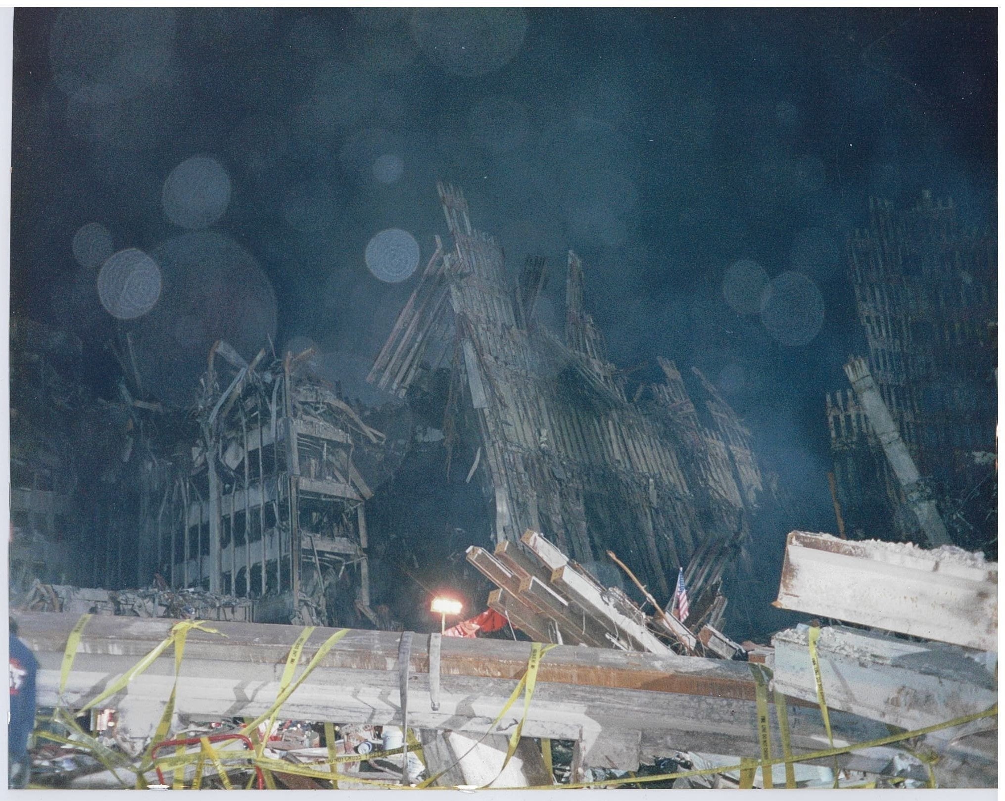 Ground Zero at night showing the immense field of debris — photograph from Brian Grisel's personal collection