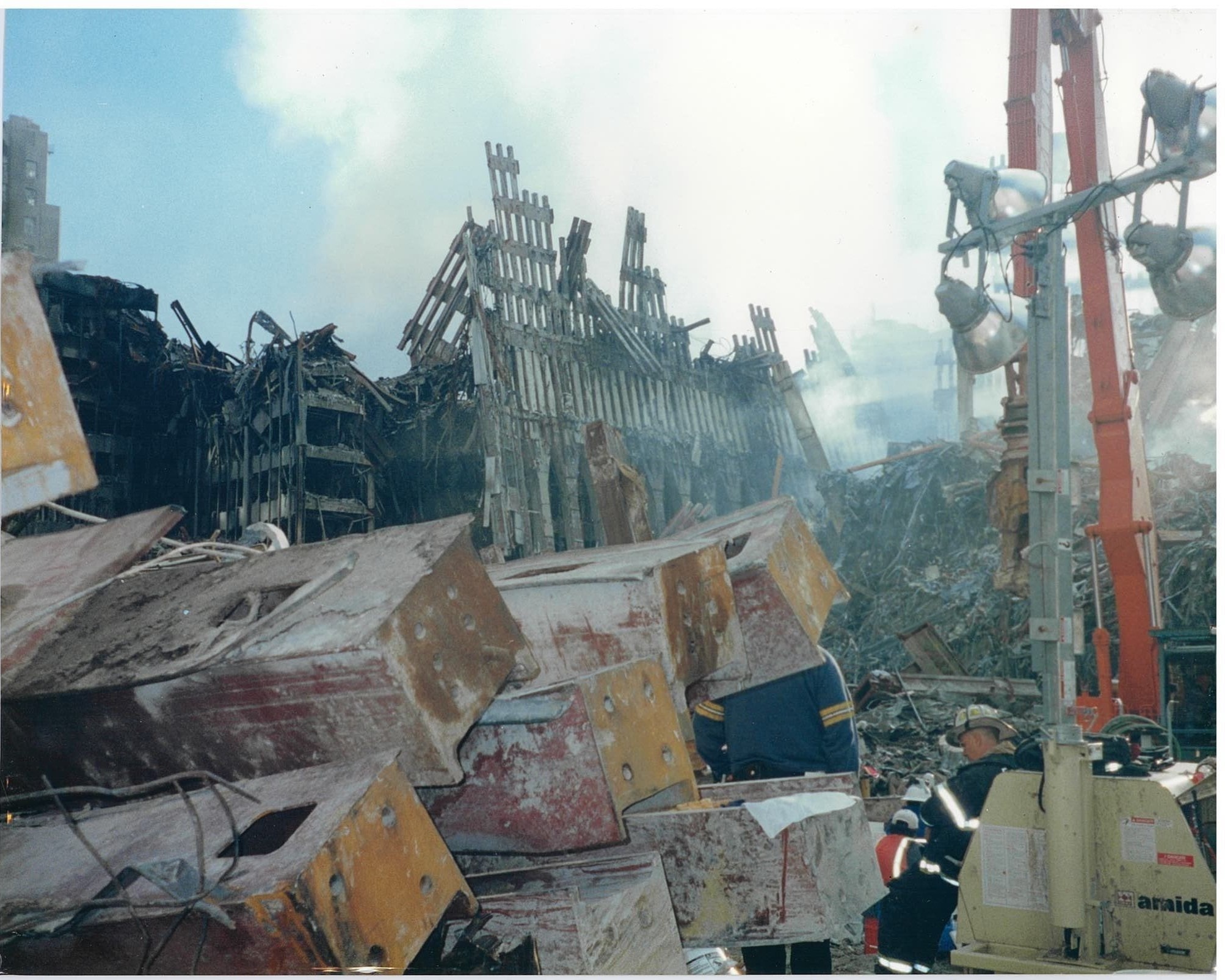 Recovery workers and heavy equipment at Ground Zero — photograph from Brian Grisel's personal collection